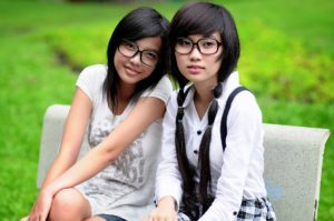 Friends Sitting On A Bench