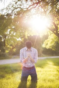 Man talking with God and praying about Scripture