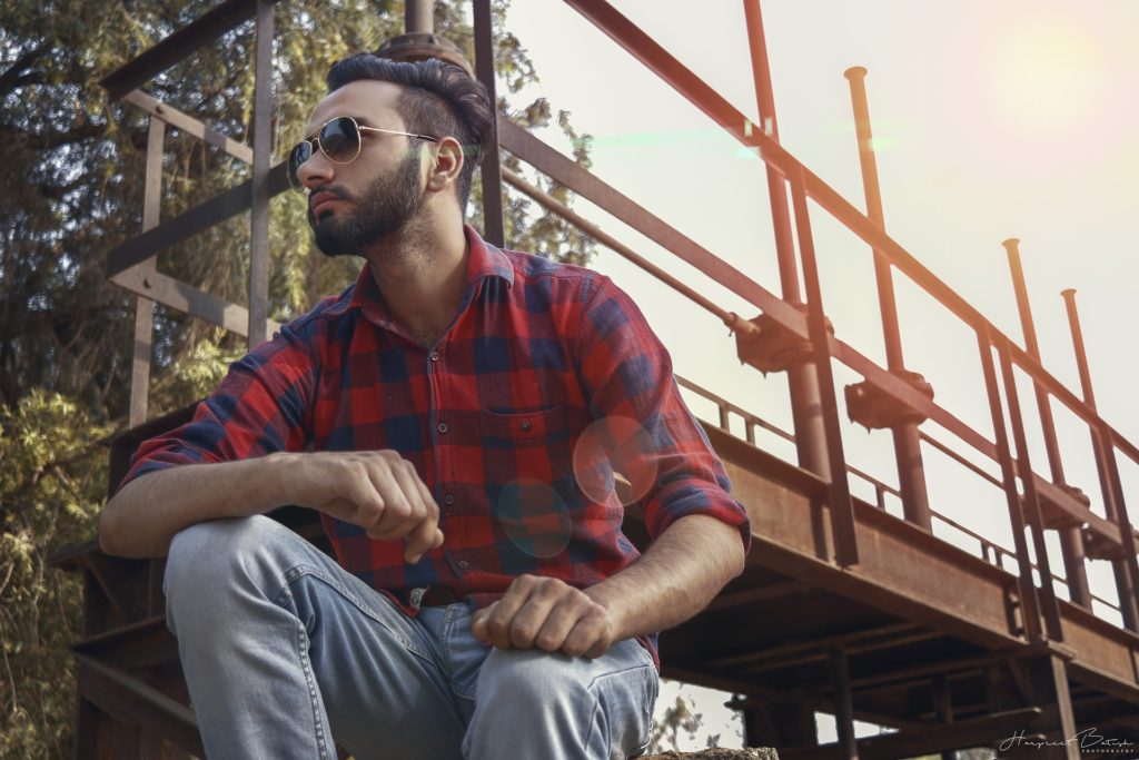 Man staring by the bridge