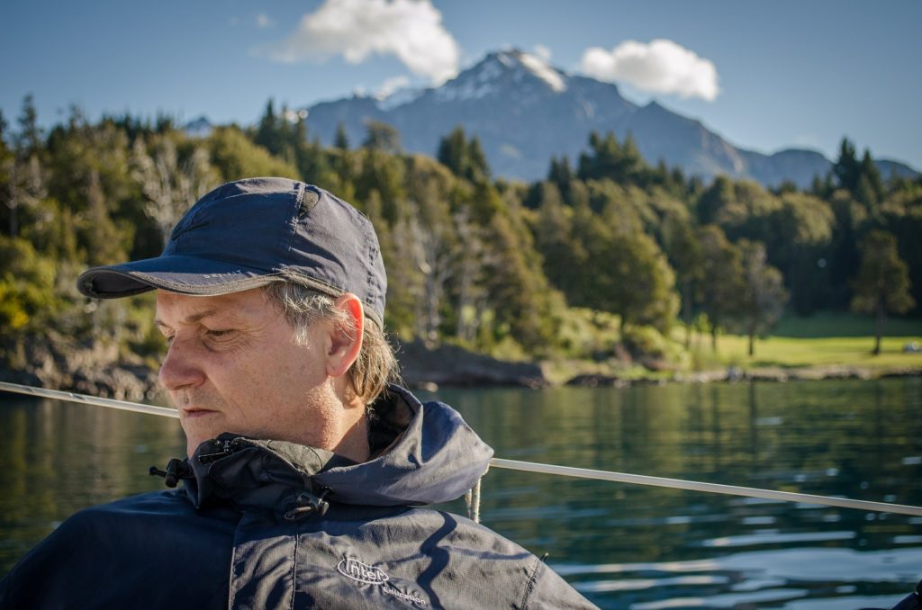 Man at lake thinking about sexual addiction rehab