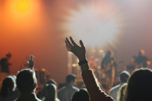 People at a concert and some deal with Compulsive Sexual Behavior