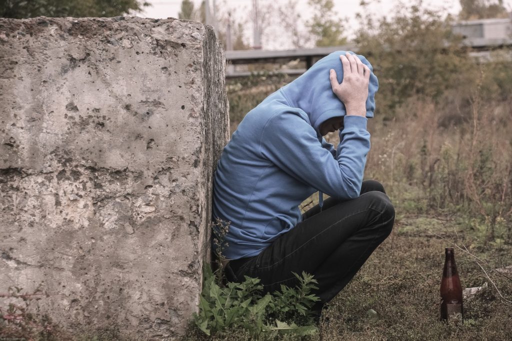 Man struggling with Alcohol