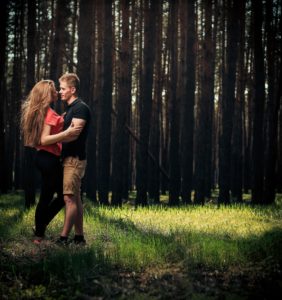 Young couple in the trees