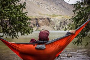 Man near the river in addiction treatment recovery