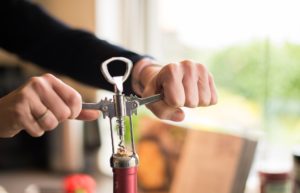 Woman drinking alcohol, struggling with depression