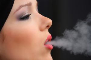 Woman Vaping Marijuana