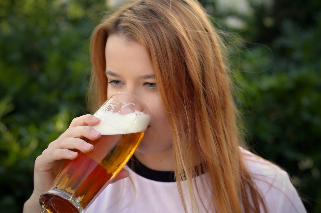 adolescents and substance abuse - Girl drinking alcohol