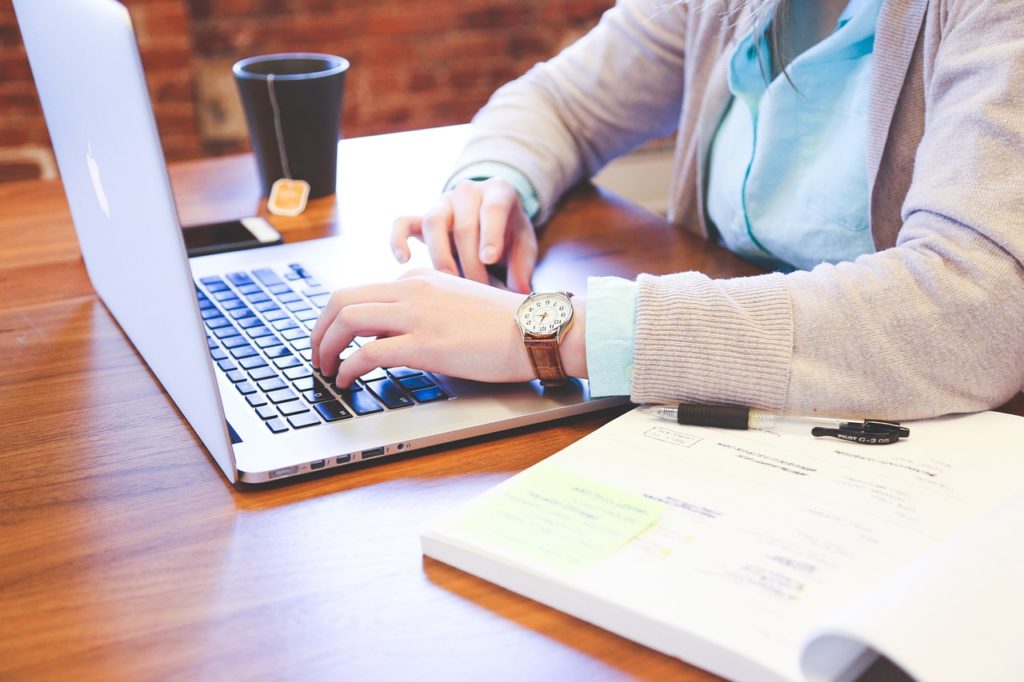 Woman researching Substance Abuse Among Students on her laptop