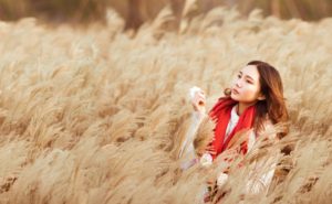 Asian American Woman or Girl in Wheat Field