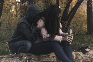 Man and woman fighting Alcohol abuse and eating disorders and has poor coping skills