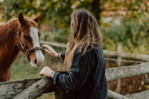 Girl fighting chronic pain with Horse 